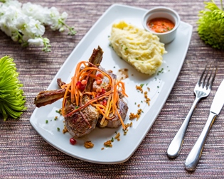 grilled-lamb-chops-served-with-palm-kernel-Jus-baby-carrots