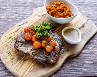 28-days-aged-T-Bone-steak-served-with-peppercorn-sauce